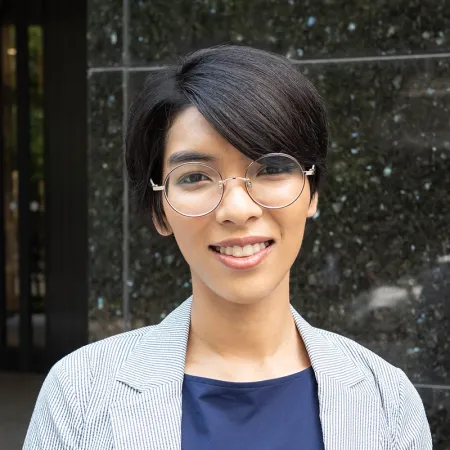 Headshot of Sayaka Ono Idris smiling at the camera.